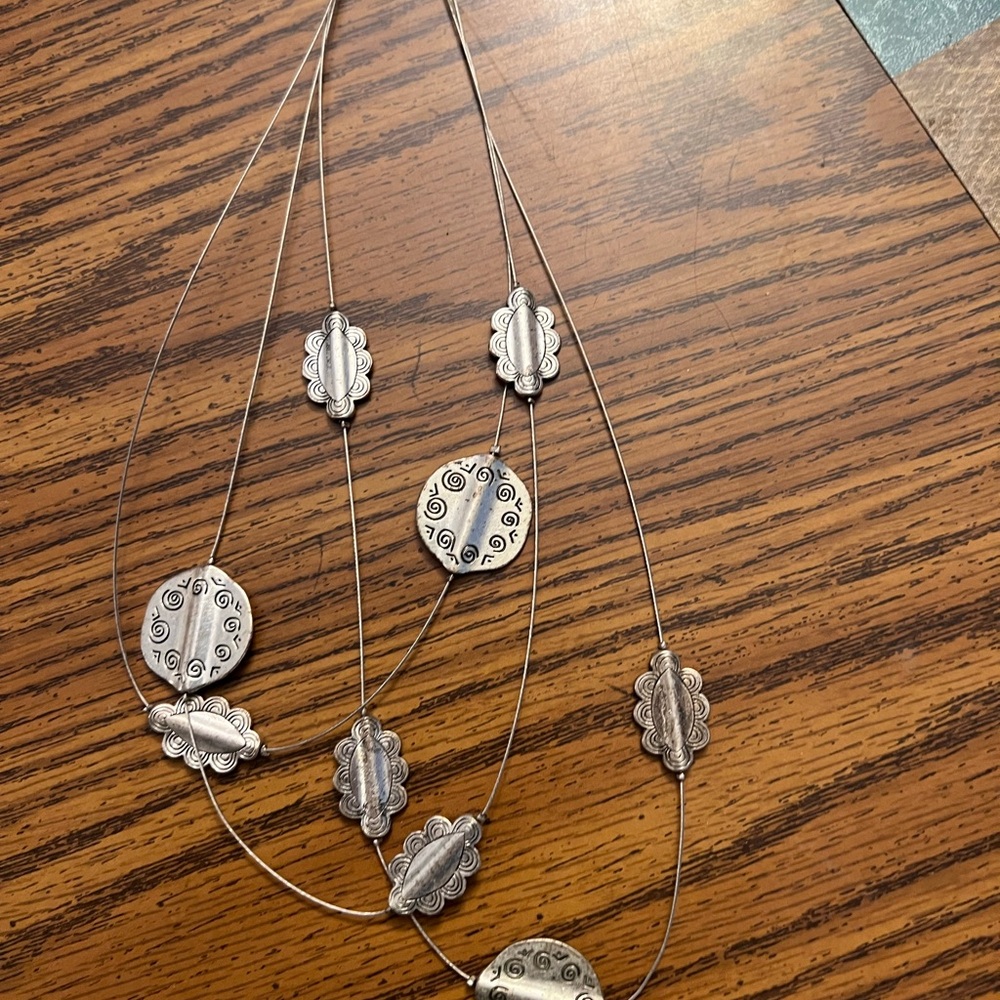 Silver Necklace with Textured Pendants and Leaf Accents - Picture 2 of 4